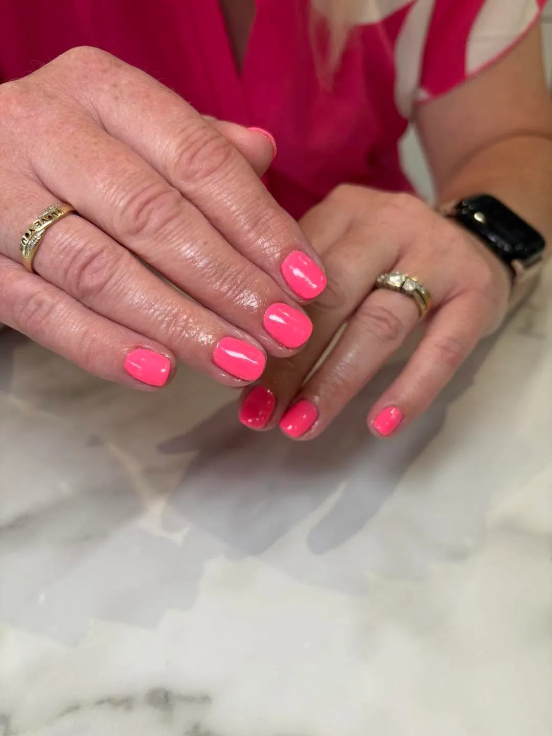 Warm coral-pink Bio Sculpture gel manicure
